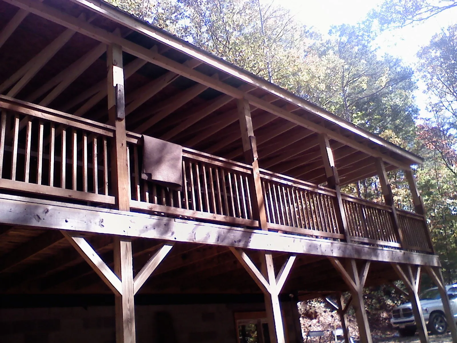 Timber framing under a new elevated porch and deck — Roof Leak Repair in Algona by Roofing Brothers